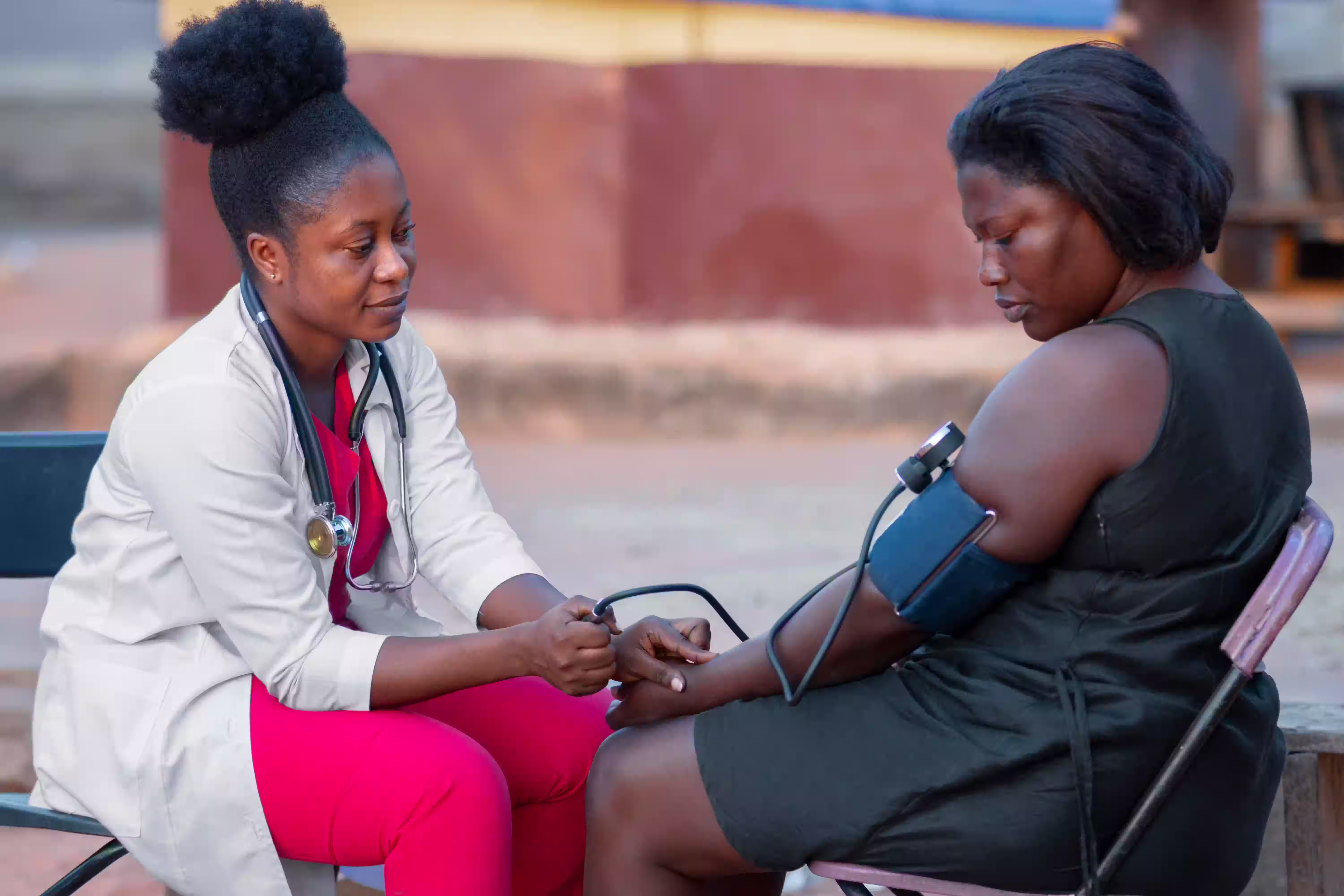 A health worker caring for a patient during a MIWA outreach screening