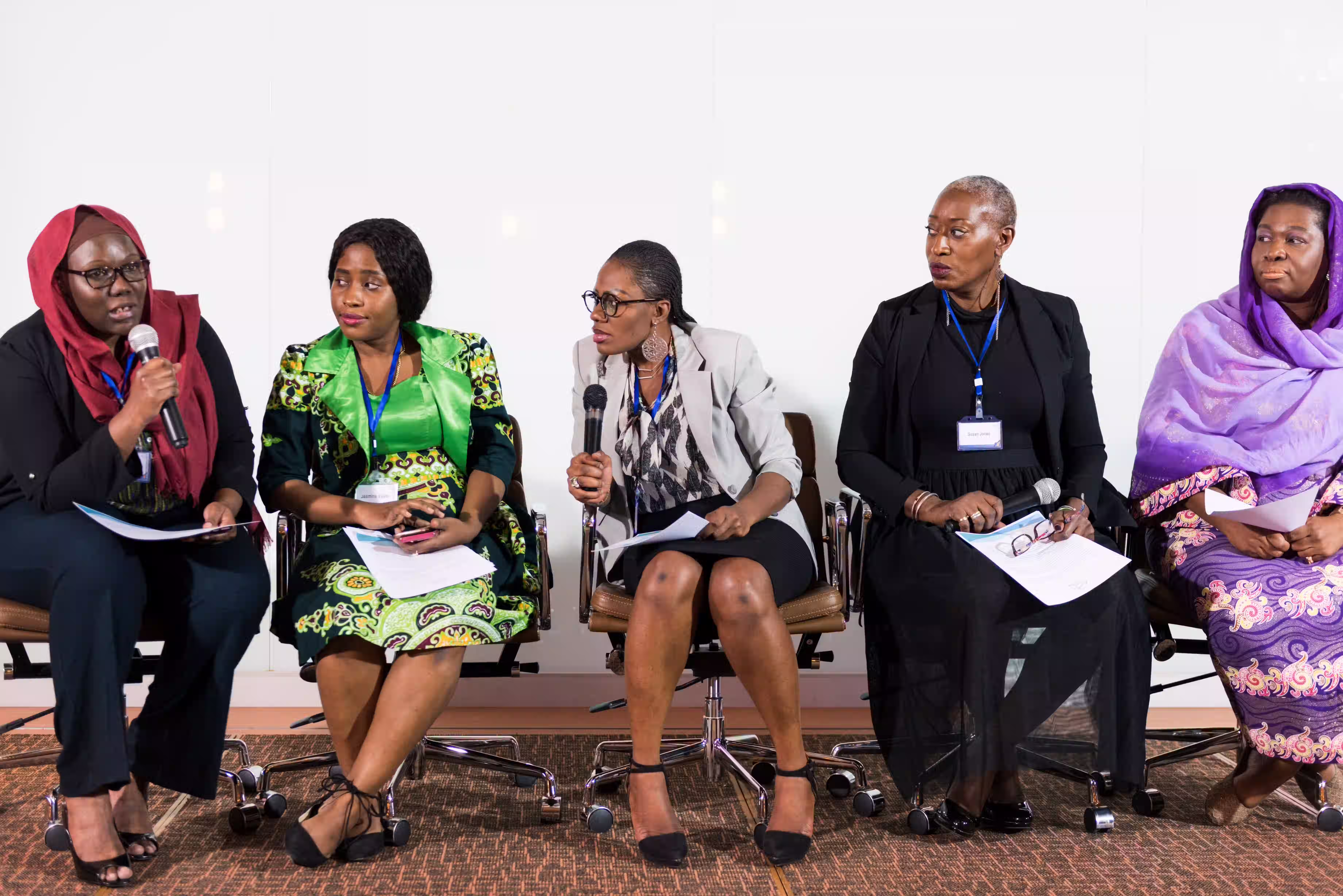 West African women leaders speaking on a panel during an advocacy and inclusion forum
